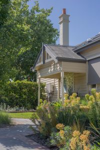 Victorian heritage home with front garden featuring native grasses succulents and drought-tolerant plants Ivanhoe Melbourne