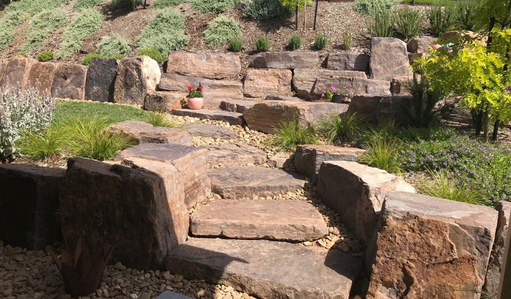Award-winning Hawthorn landscape design with formal parterre garden and period-appropriate stone paving.